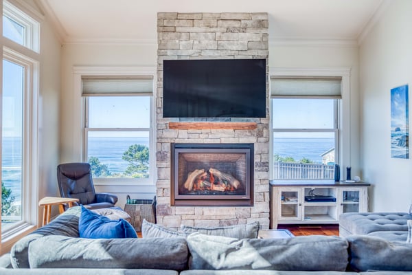 Sunset Point-102 - Airy, soaring ceilings and a stacked-rock fireplace