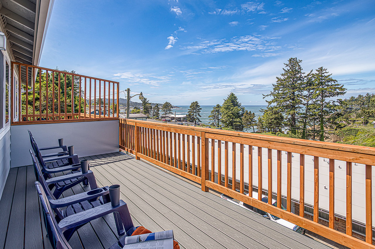 Relax on your private deck with sweeping ocean views, lined with comfortable seating where you can soak in coastal breezes and endless blue horizons.