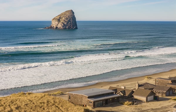 3.1 Stunning beachfront property with direct sand access and dramatic sea stack formations creating an unforgettable coastal experience.