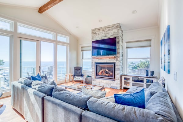 Sunset Point-101 - Airy, soaring ceilings and a stacked-rock fireplace create the ultimate sanctuary for slow afternoons.