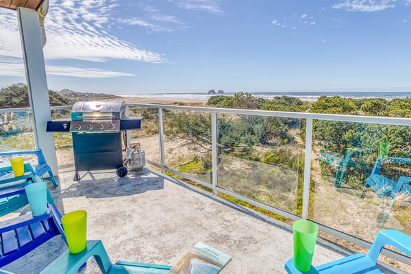 Grill your favorite meals on this spacious terrace while soaking in breathtaking coastal views that stretch to the horizon.