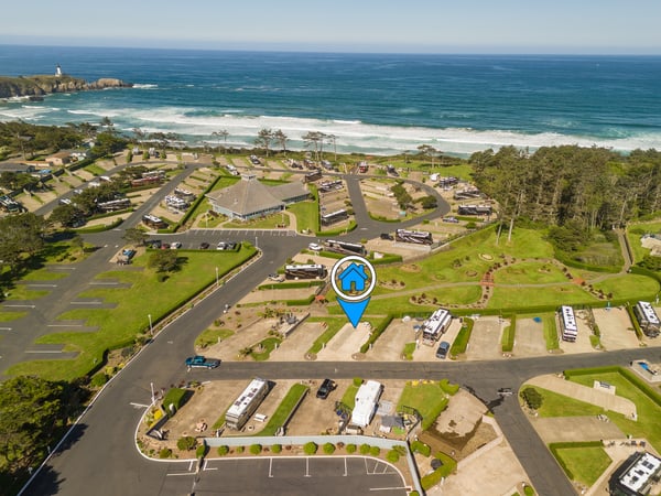 Coastal vacation rental community situated steps from pristine beaches with lighthouse views and ocean breezes defining this scenic property location.