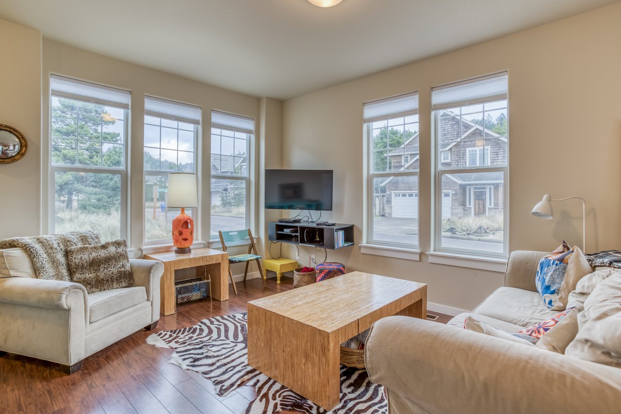 Living Area with television and ample lighting