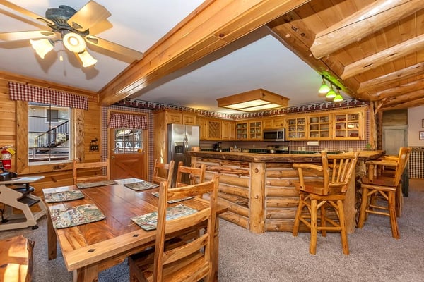 Dining Area & Kitchen With Bar Seating