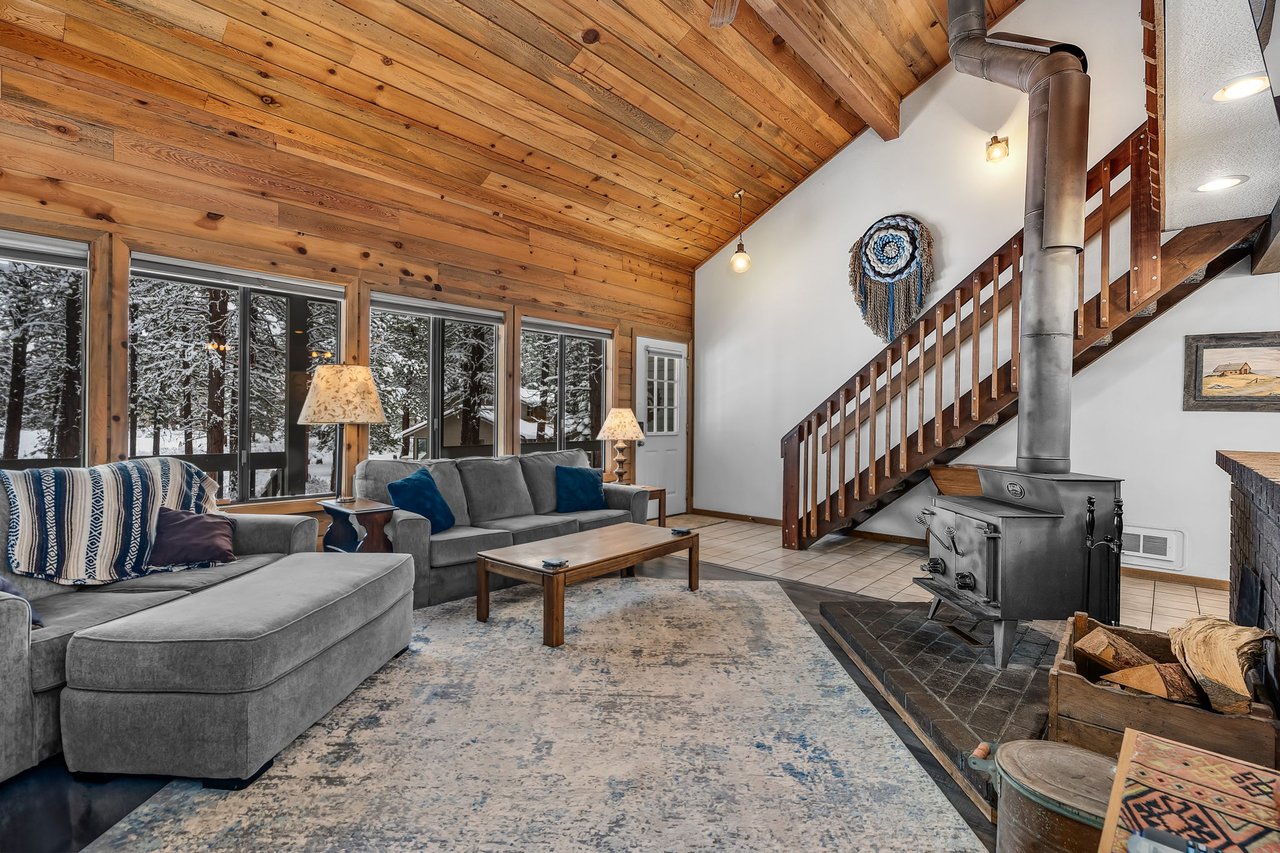 Kiera's Cabin Black Butte Ranch-Living room with stairs and woodstove