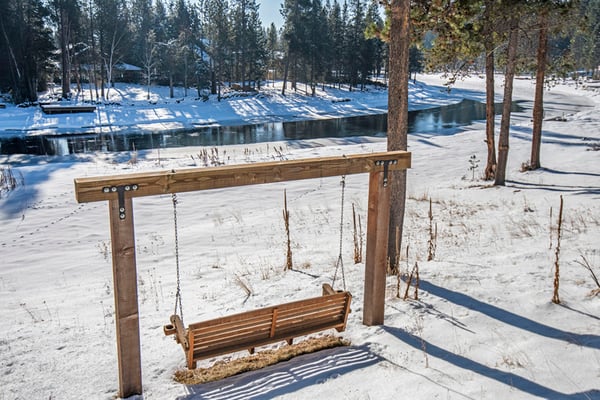 Wooden Swing on a Porch