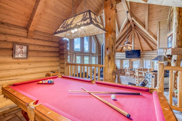 pool table attached to the living room