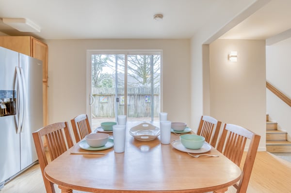 Dining Table with cutlery extending to balcony