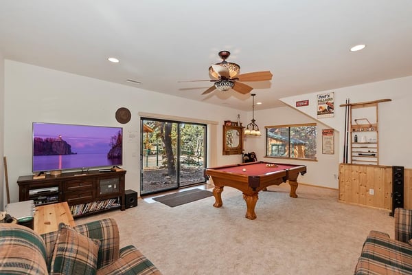 Game Room Featuring Flat Screen TV with Selection of Movies